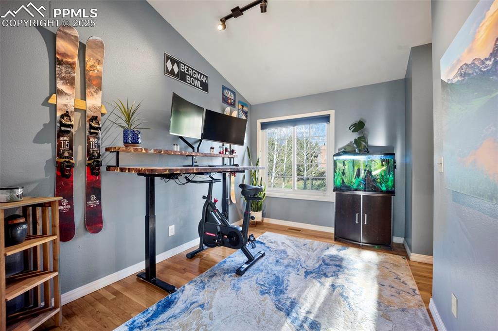 17810 New London Road Monument, CO 80132 - Photo 33 of 50 a view of a workspace with furniture and a window