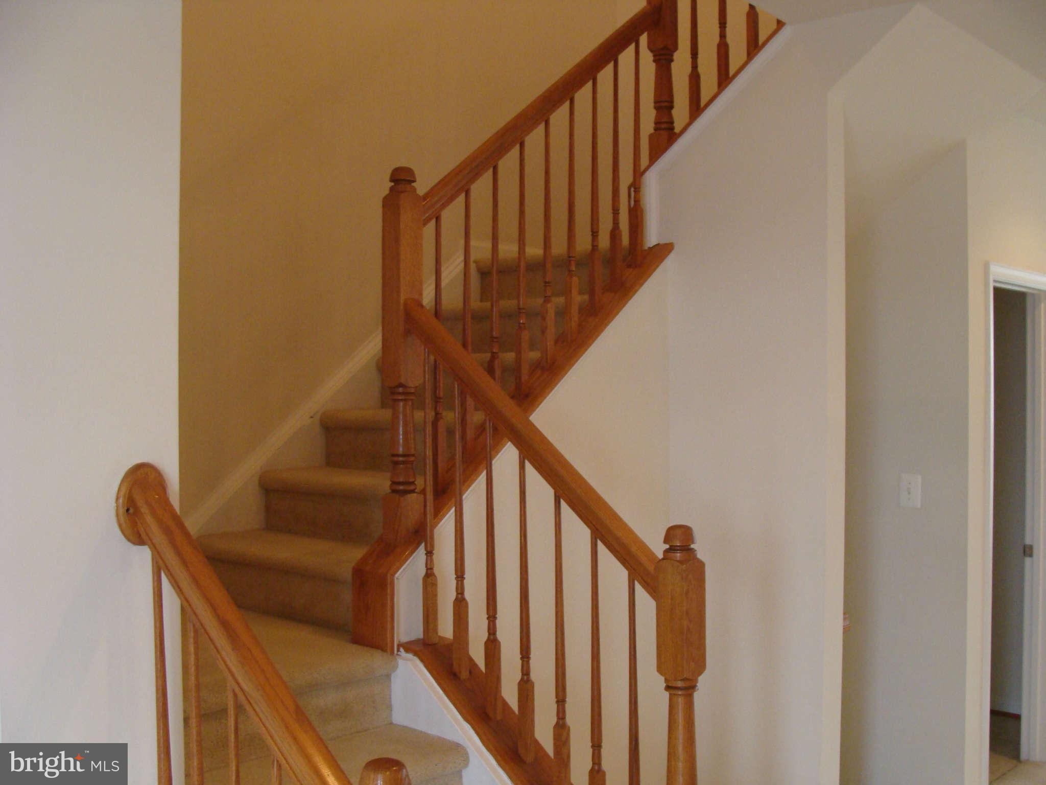17692 Possum Point Road Dumfries, VA 22026 - Photo 8 of 29 View staircase to upper level