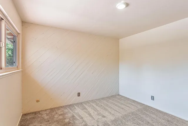 a view of a room with a window