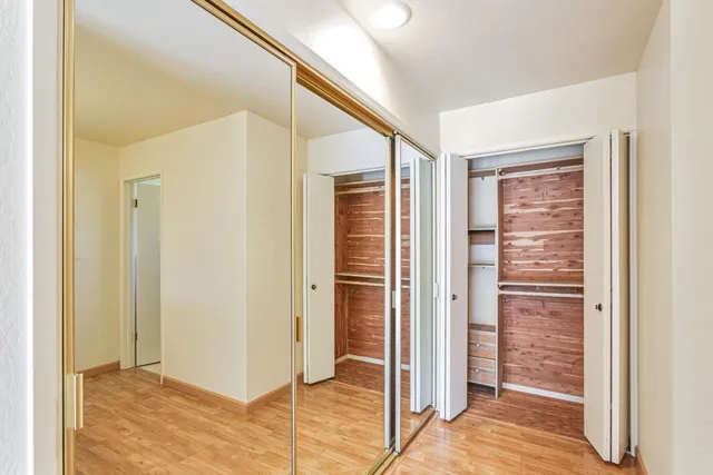 a bathroom with a sink vanity and a mirror