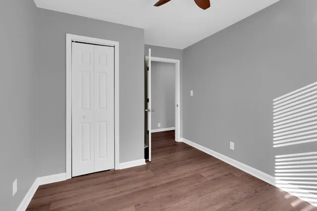 a view of a bathroom from the hallway