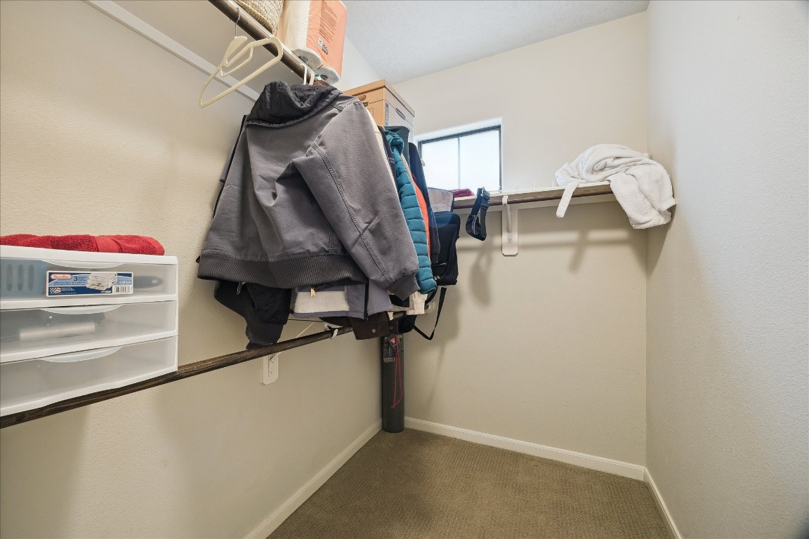 1110 West 25th Street Houston, TX 77008 - Photo 16 of 40 a view of walk in closet with clothes and shoes
