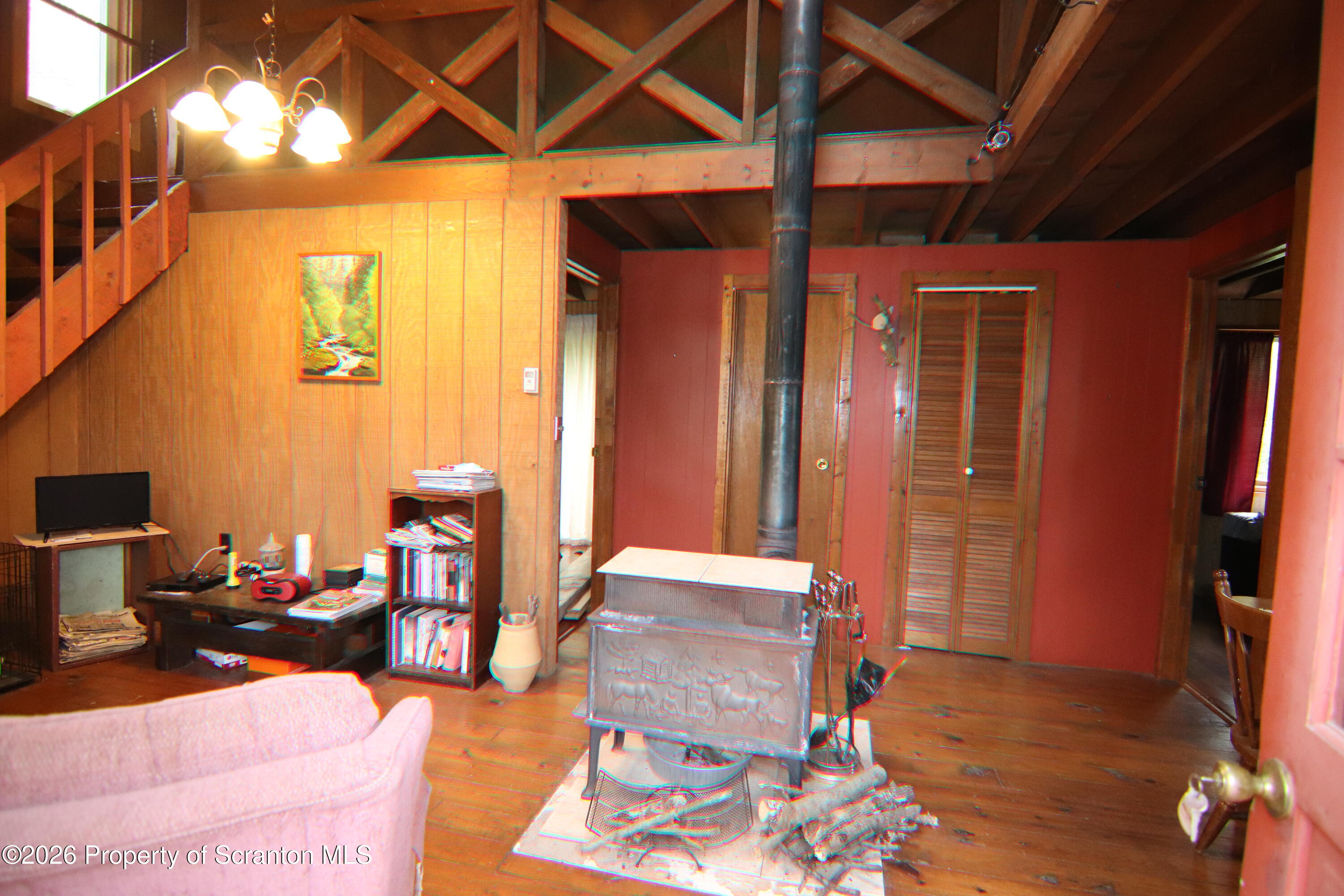 300 Pennsworth Hill Road Meshoppen, PA 18630 - Photo 8 of 38 a living room with furniture a dining table and chairs with wooden floor
