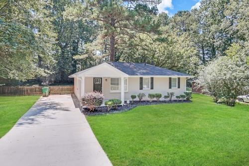 3645 Larkspur Terrace Decatur, GA 30032 - Photo 2 of 25 a front view of a house with a yard