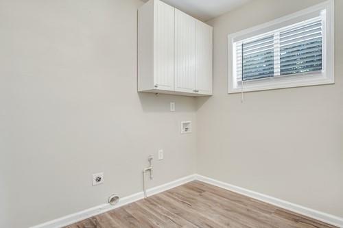 3645 Larkspur Terrace Decatur, GA 30032 - Photo 25 of 25 a view of an empty room with wooden floor and a window