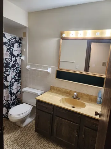 a view of a hallway with washer and dryer