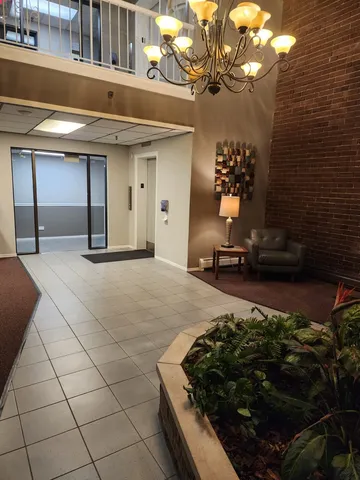 a bathroom with a shower and a window