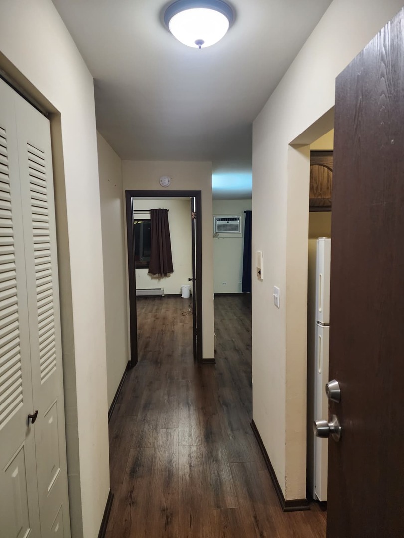 235 North Mill Road, Unit 106B Addison, IL 60101 - Photo 6 of 22 wooden floor in a gallery