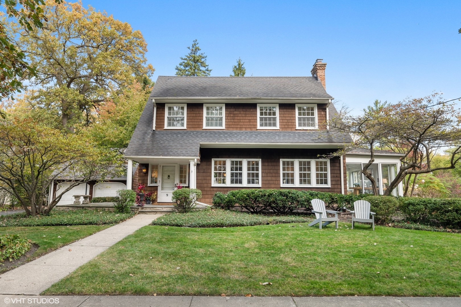 9 Warwick Road Winnetka, IL 60093 - Photo 1 of 54 a front view of a house with a yard