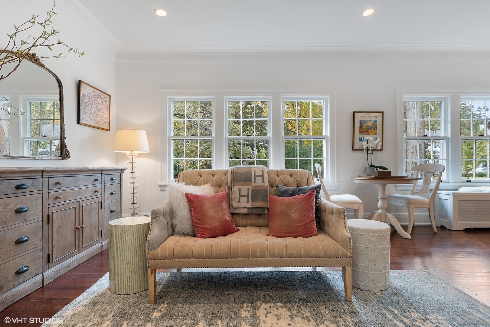 9 Warwick Road Winnetka, IL 60093 - Photo 11 of 54 a living room with furniture a large window and wooden floor