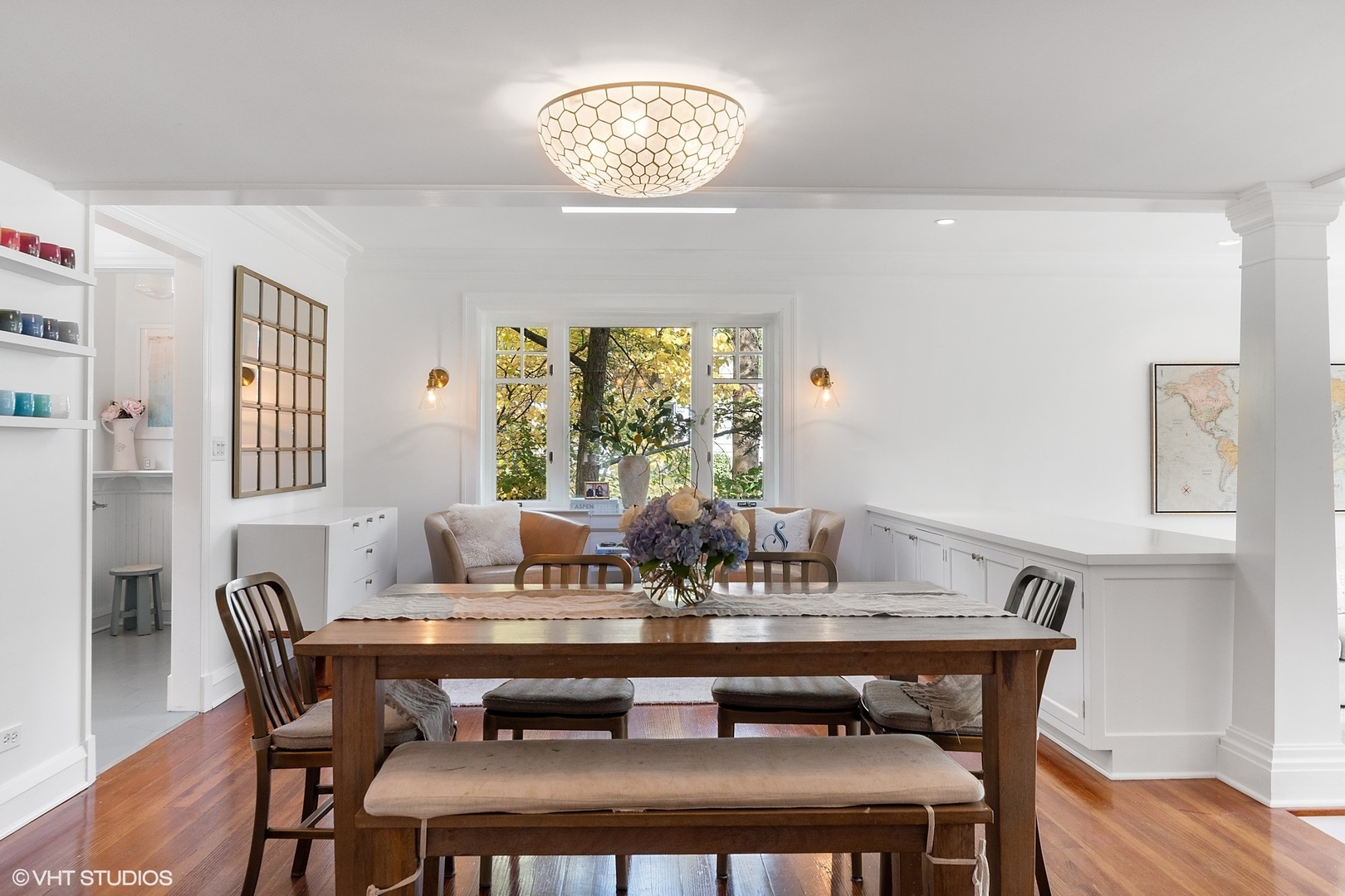 9 Warwick Road Winnetka, IL 60093 - Photo 19 of 54 a view of a dining room with furniture window and wooden floor