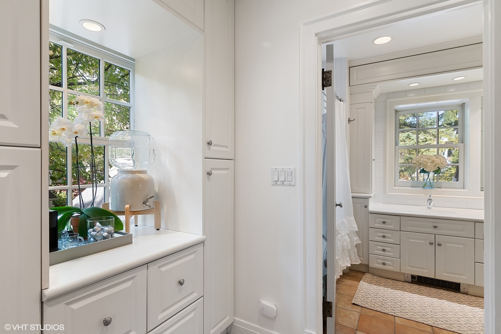 9 Warwick Road Winnetka, IL 60093 - Photo 29 of 54 a bathroom with a sink and a mirror