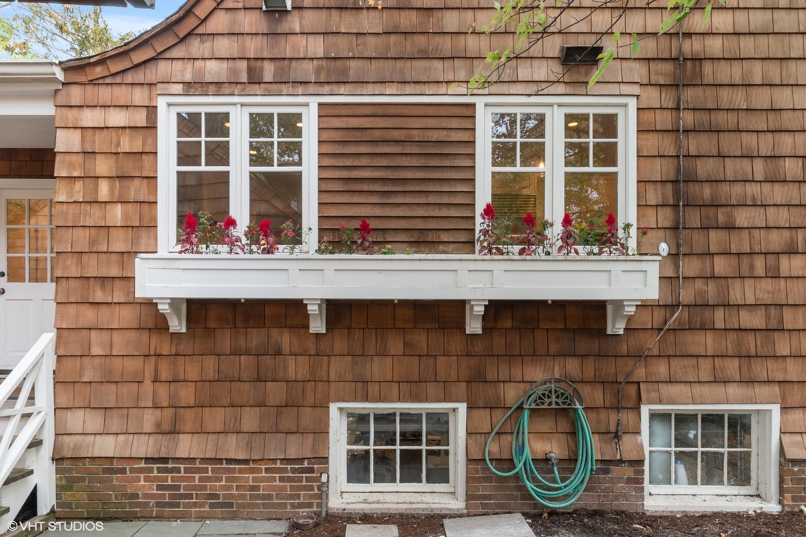 9 Warwick Road Winnetka, IL 60093 - Photo 4 of 54 a front view of a building with a window