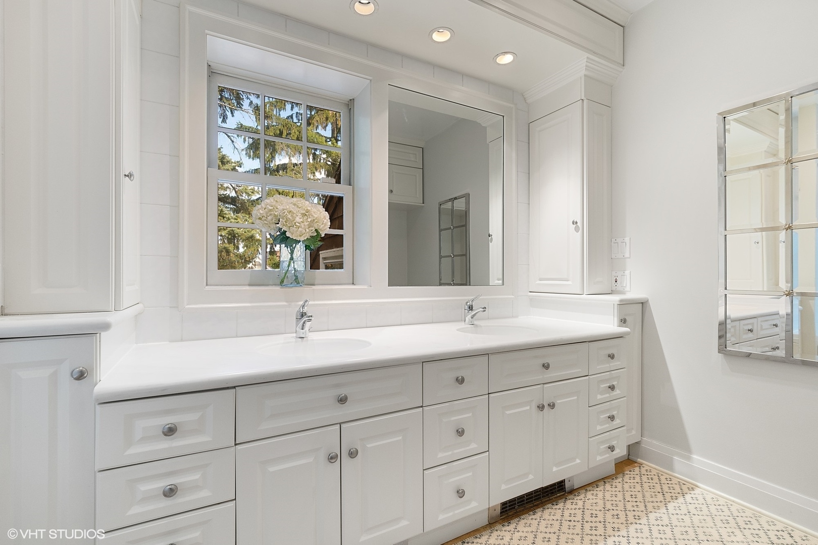 9 Warwick Road Winnetka, IL 60093 - Photo 32 of 54 a bathroom with a sink and a window