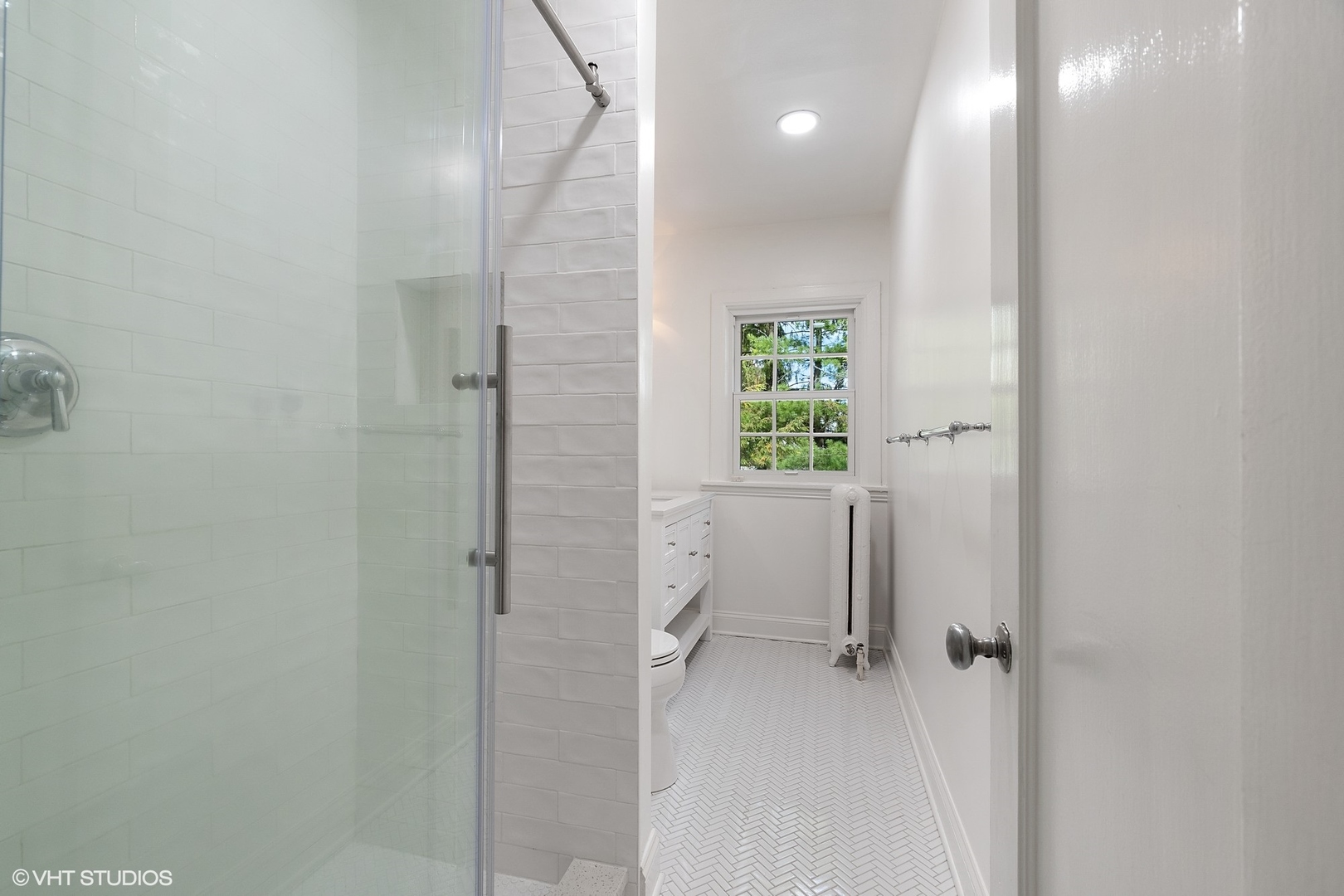9 Warwick Road Winnetka, IL 60093 - Photo 39 of 54 a bathroom with a granite countertop shower and a toilet