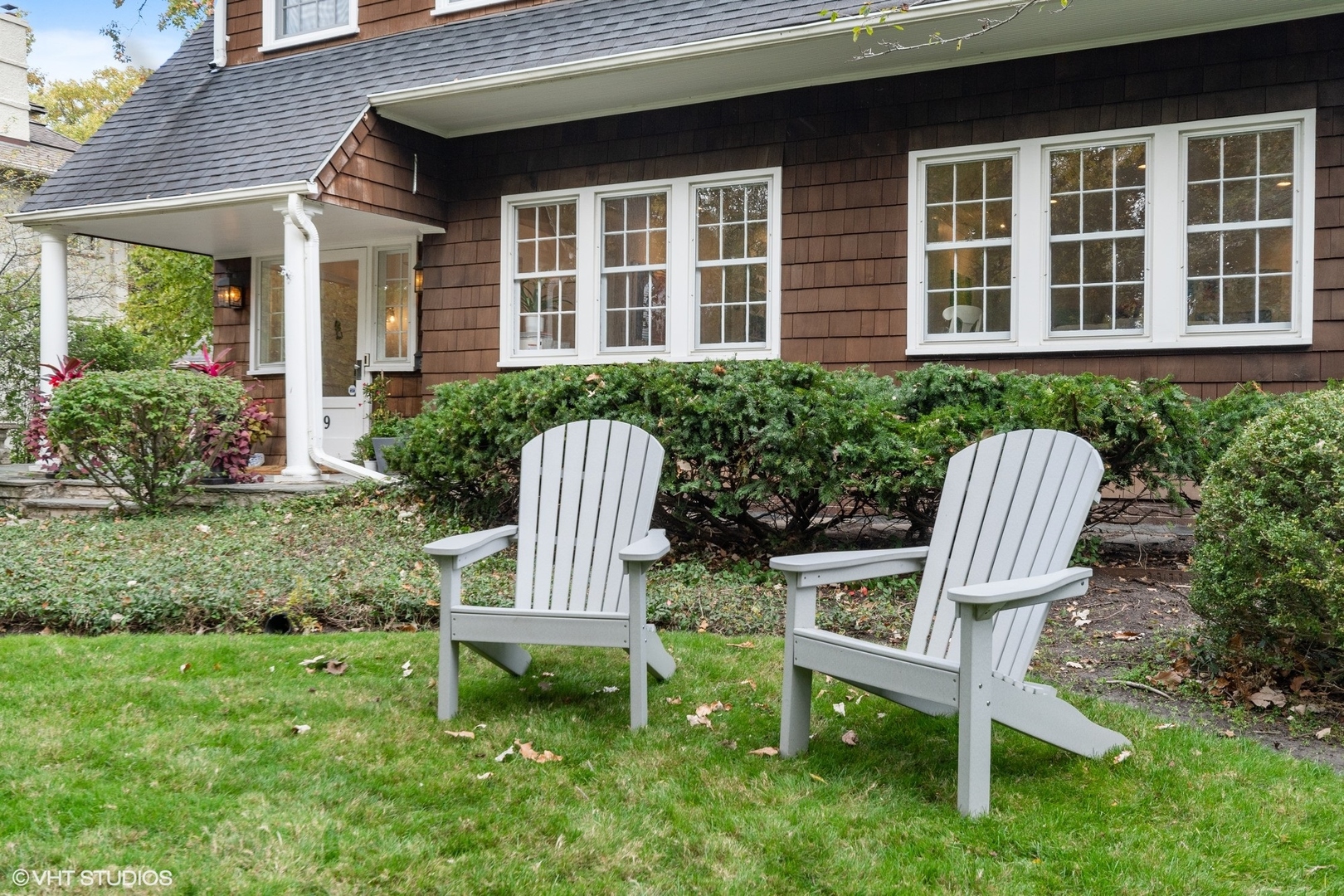 9 Warwick Road Winnetka, IL 60093 - Photo 6 of 54 a view of a wooden chairs in backyard of house