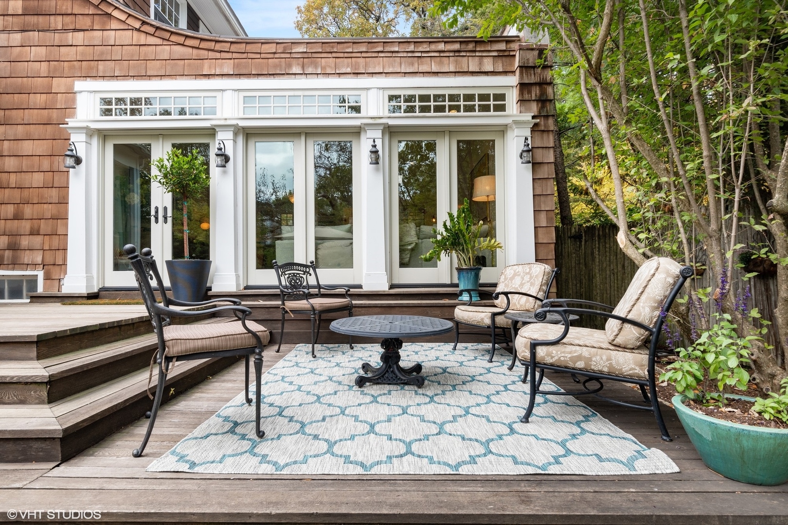 9 Warwick Road Winnetka, IL 60093 - Photo 51 of 54 a building outdoor space with patio furniture and potted plants