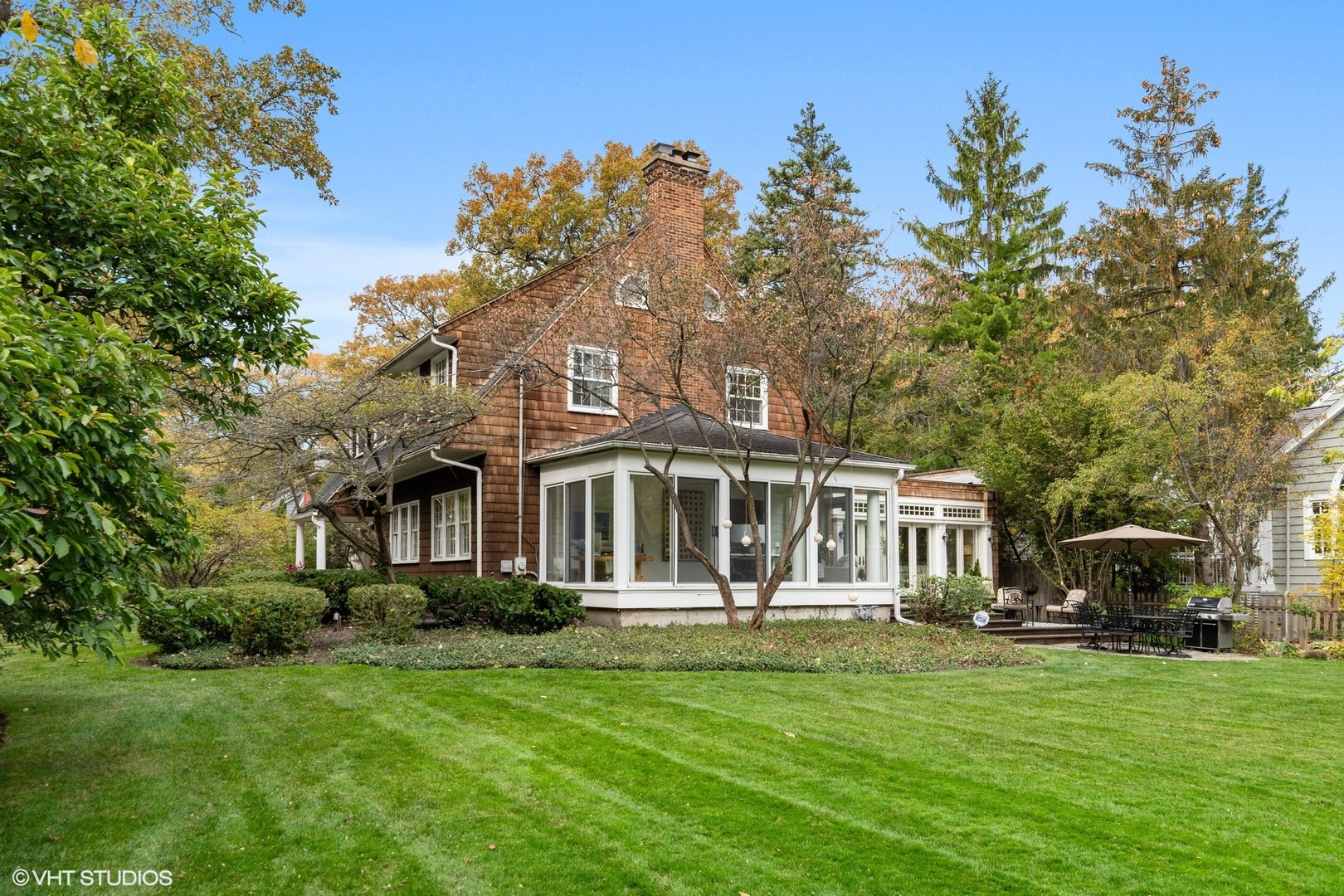 9 Warwick Road Winnetka, IL 60093 - Photo 54 of 54 a front view of a house with a garden
