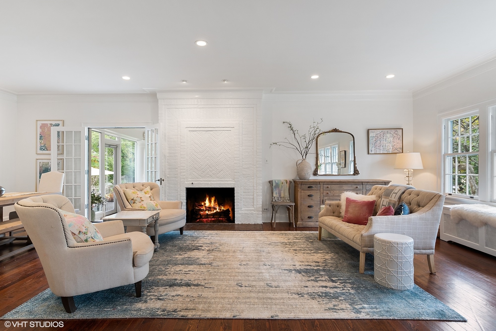 9 Warwick Road Winnetka, IL 60093 - Photo 10 of 54 a living room with furniture and a fireplace