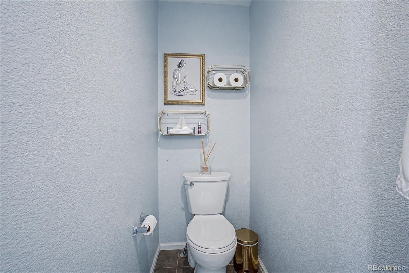 2921 Fulton Street Denver, CO 80238 - Photo 24 of 42 a bathroom with a toilet and a sink