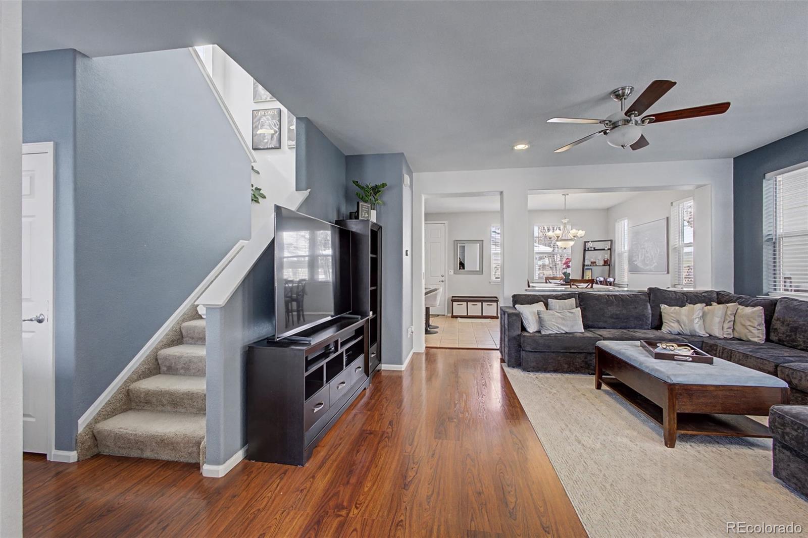 2921 Fulton Street Denver, CO 80238 - Photo 4 of 42 a living room with furniture and a wooden floor