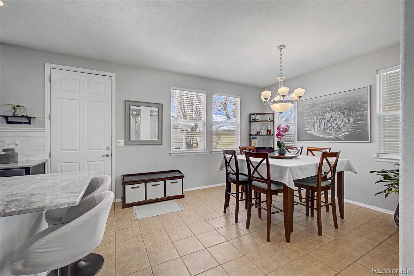2921 Fulton Street Denver, CO 80238 - Photo 10 of 42 a view of a dining room with furniture