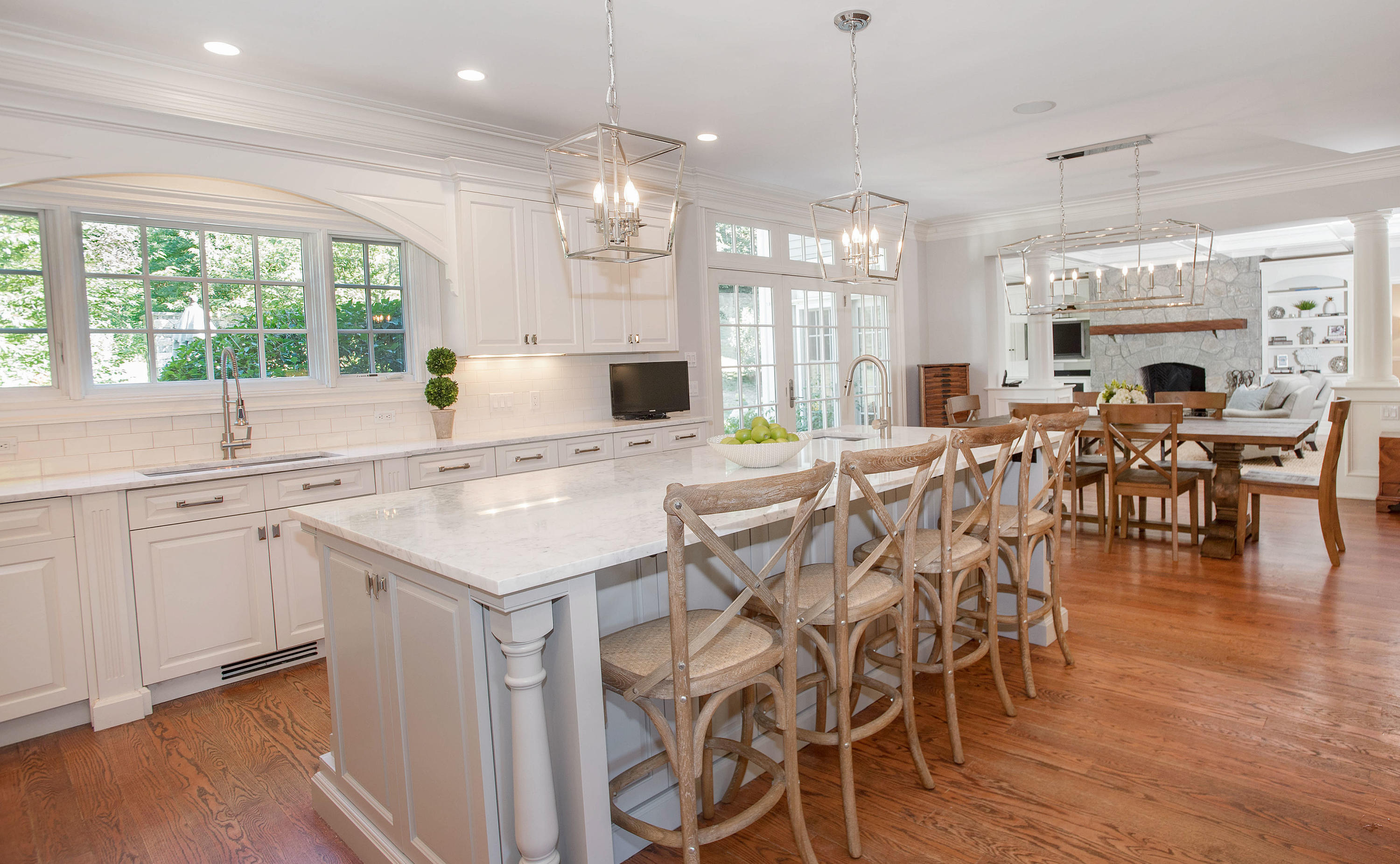 20 Silvermine Road New Canaan, CT 06840 - Photo 11 of 45 a large kitchen with a table and chairs