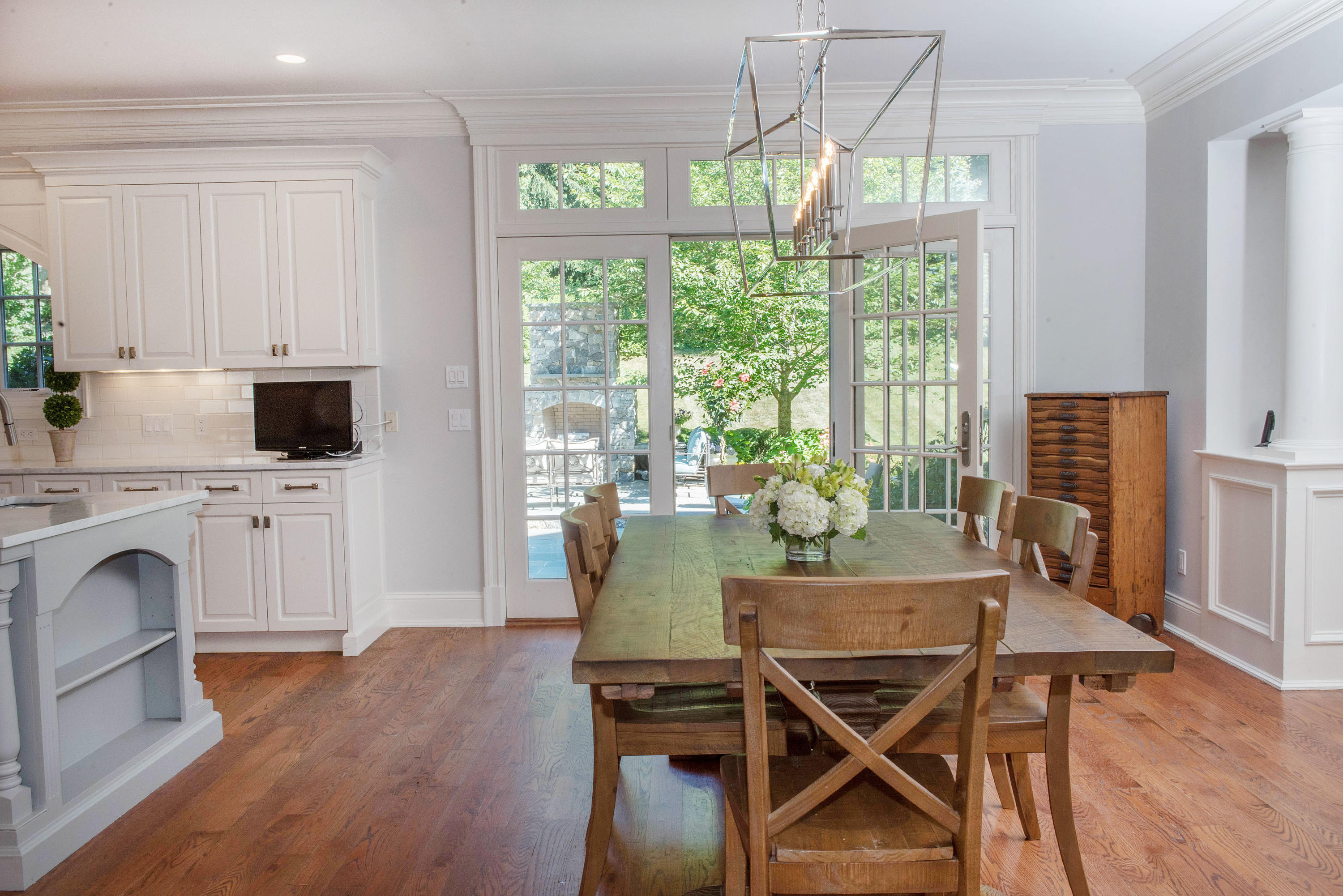 20 Silvermine Road New Canaan, CT 06840 - Photo 12 of 45 a view of a dining room with furniture window and wooden floor