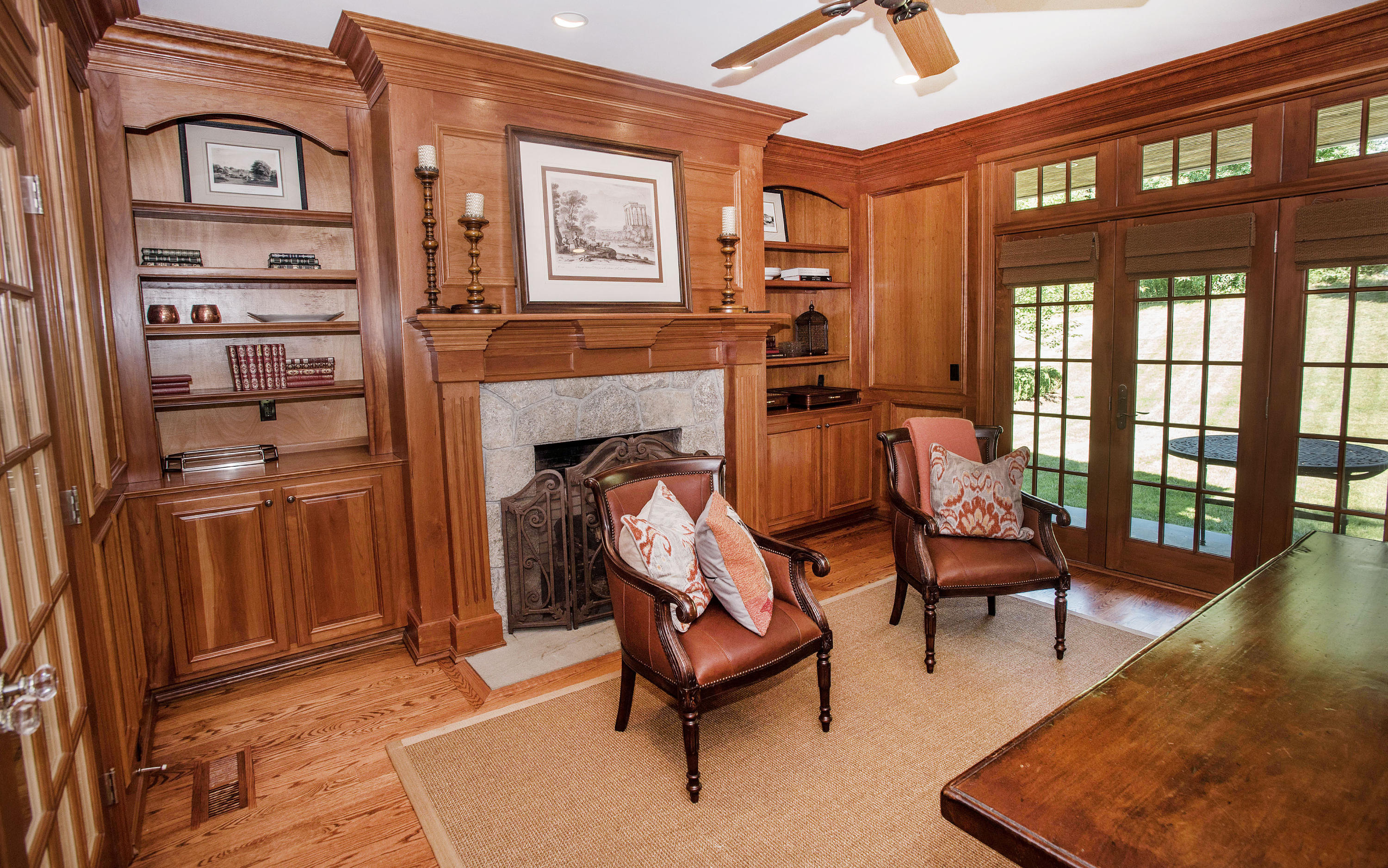 20 Silvermine Road New Canaan, CT 06840 - Photo 17 of 45 a living room with furniture a rug and a fireplace