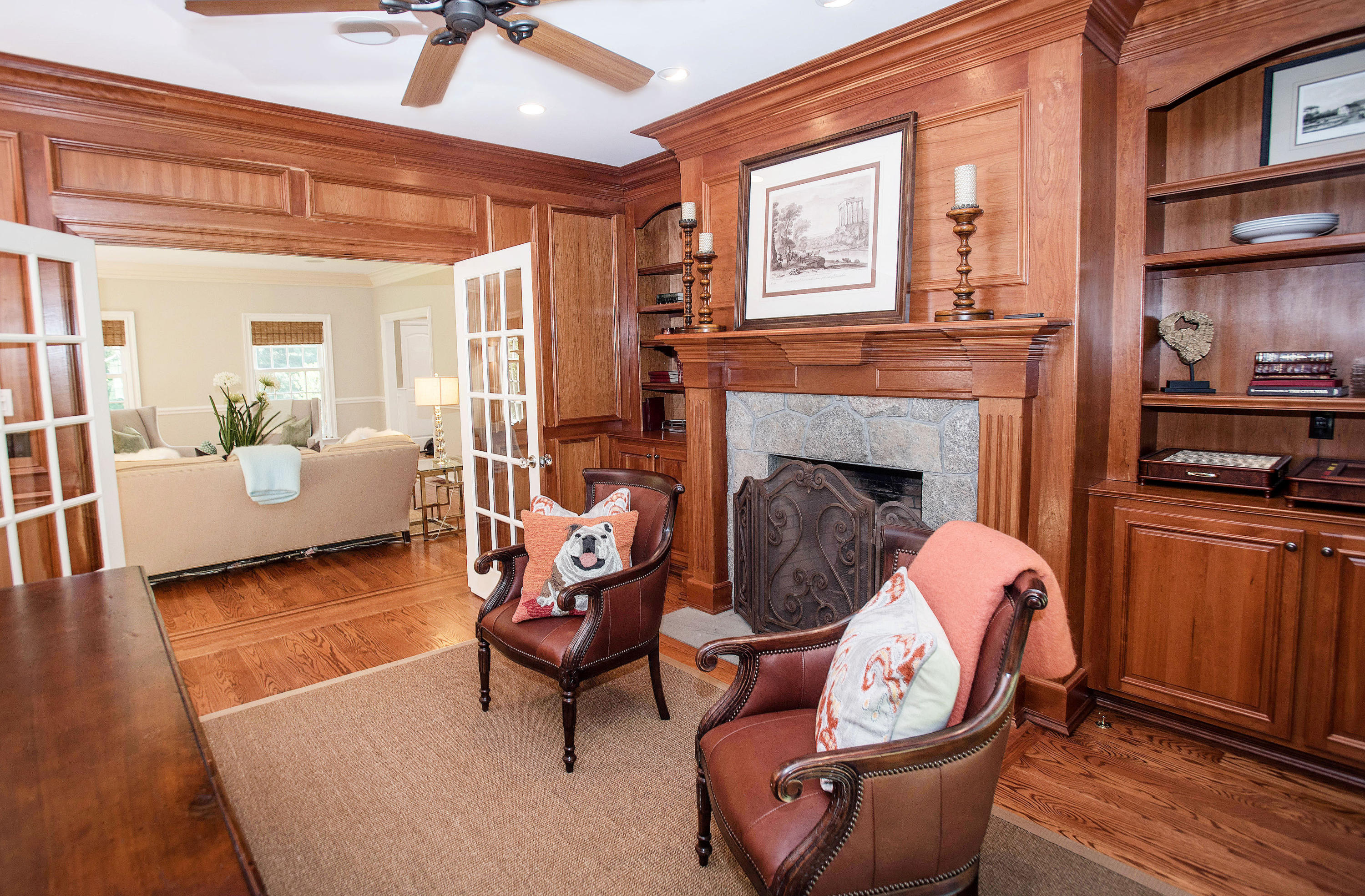 20 Silvermine Road New Canaan, CT 06840 - Photo 18 of 45 a living room with furniture and a fireplace