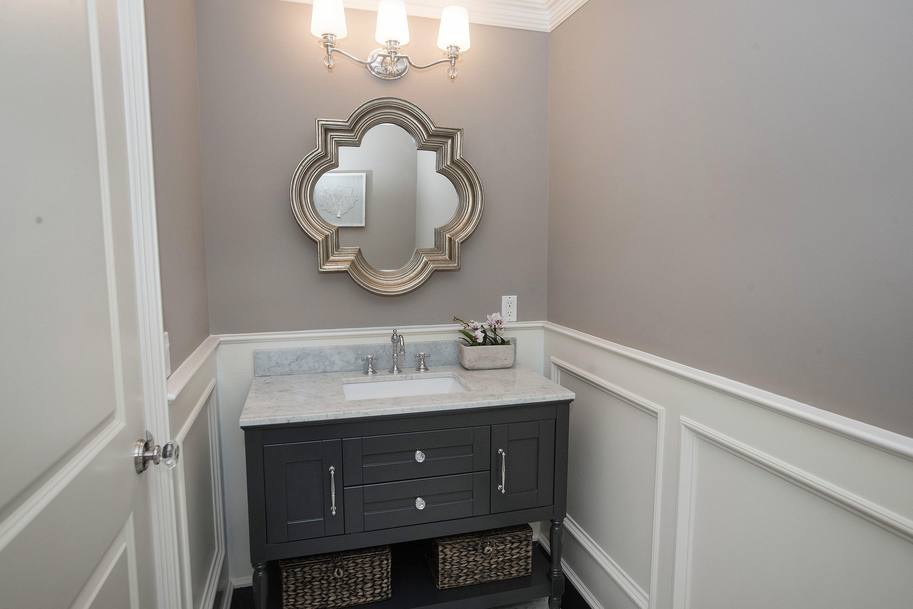 20 Silvermine Road New Canaan, CT 06840 - Photo 19 of 45 a bathroom with a sink and a mirror