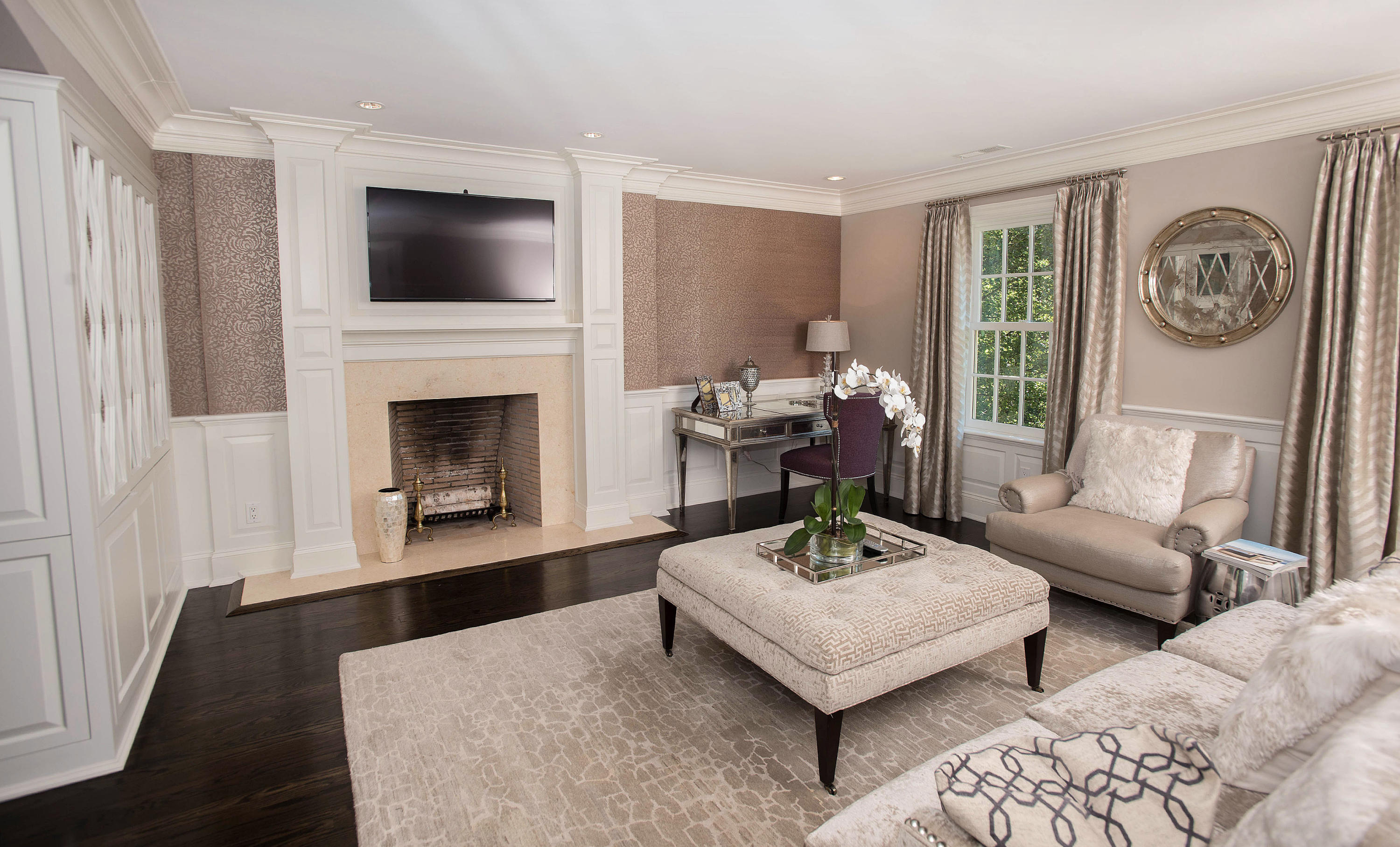 20 Silvermine Road New Canaan, CT 06840 - Photo 22 of 45 a living room with furniture a rug and a fireplace