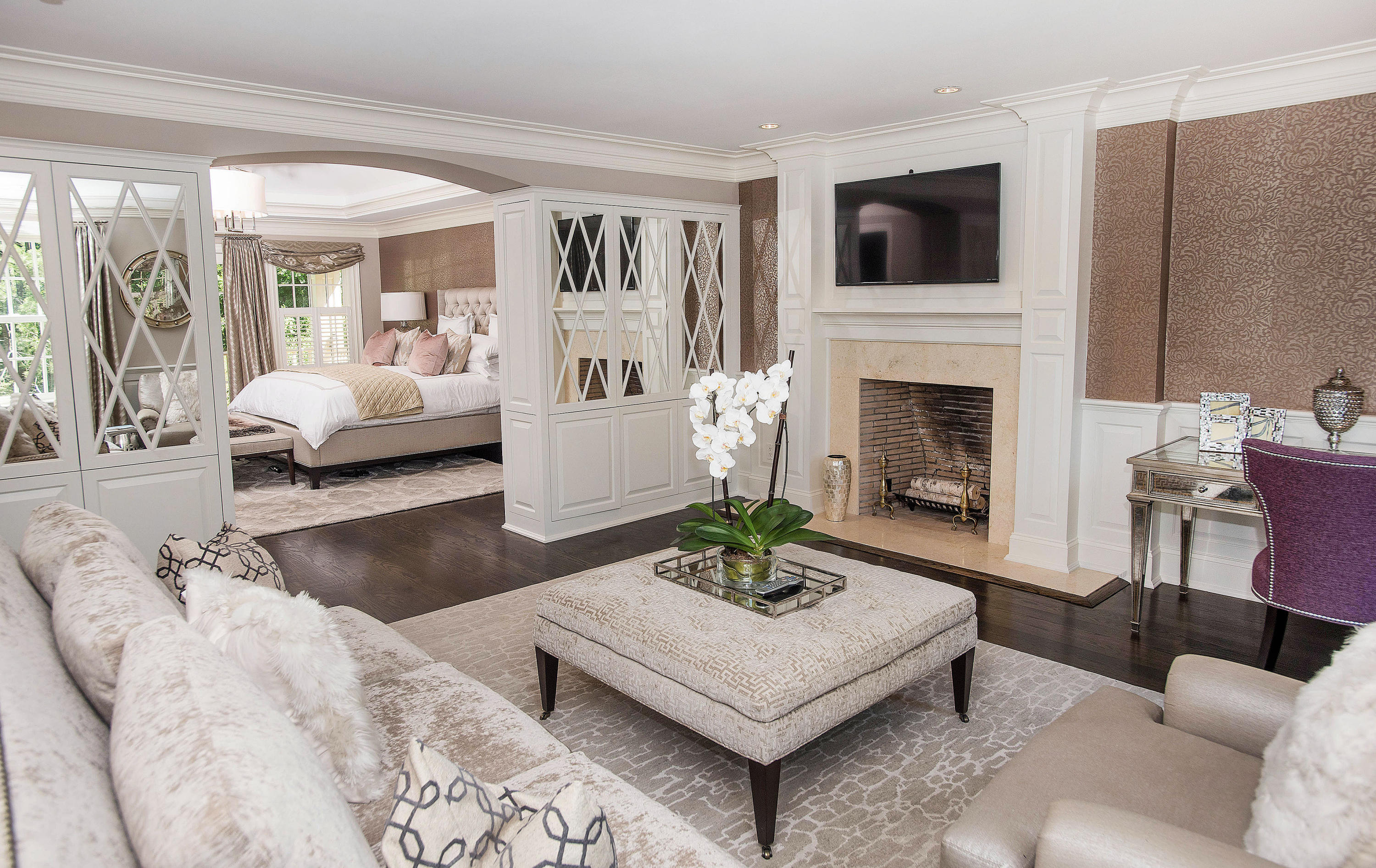 20 Silvermine Road New Canaan, CT 06840 - Photo 23 of 45 a living room with furniture a fireplace and a flat screen tv