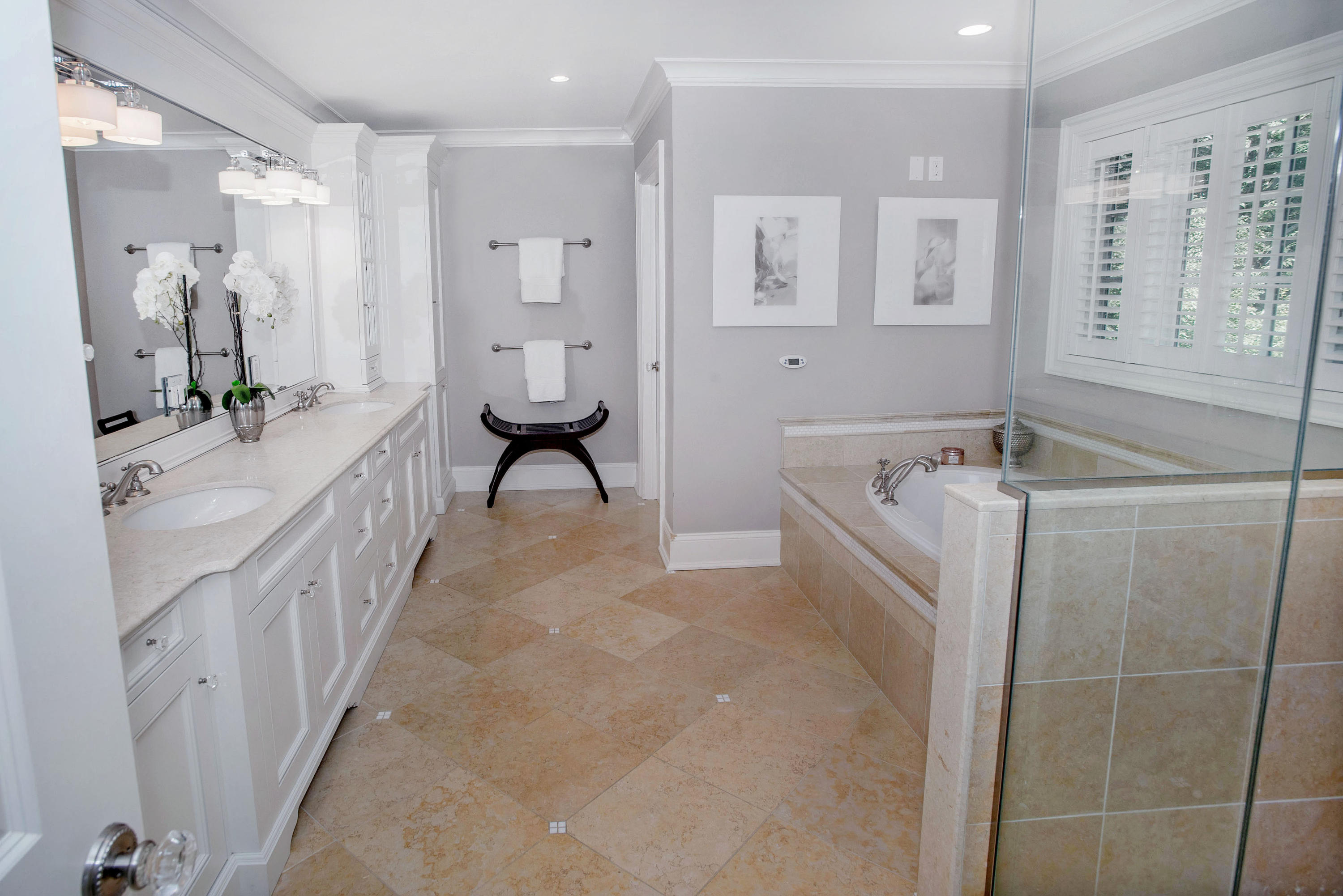 20 Silvermine Road New Canaan, CT 06840 - Photo 26 of 45 a spacious bathroom with a tub sink and mirror