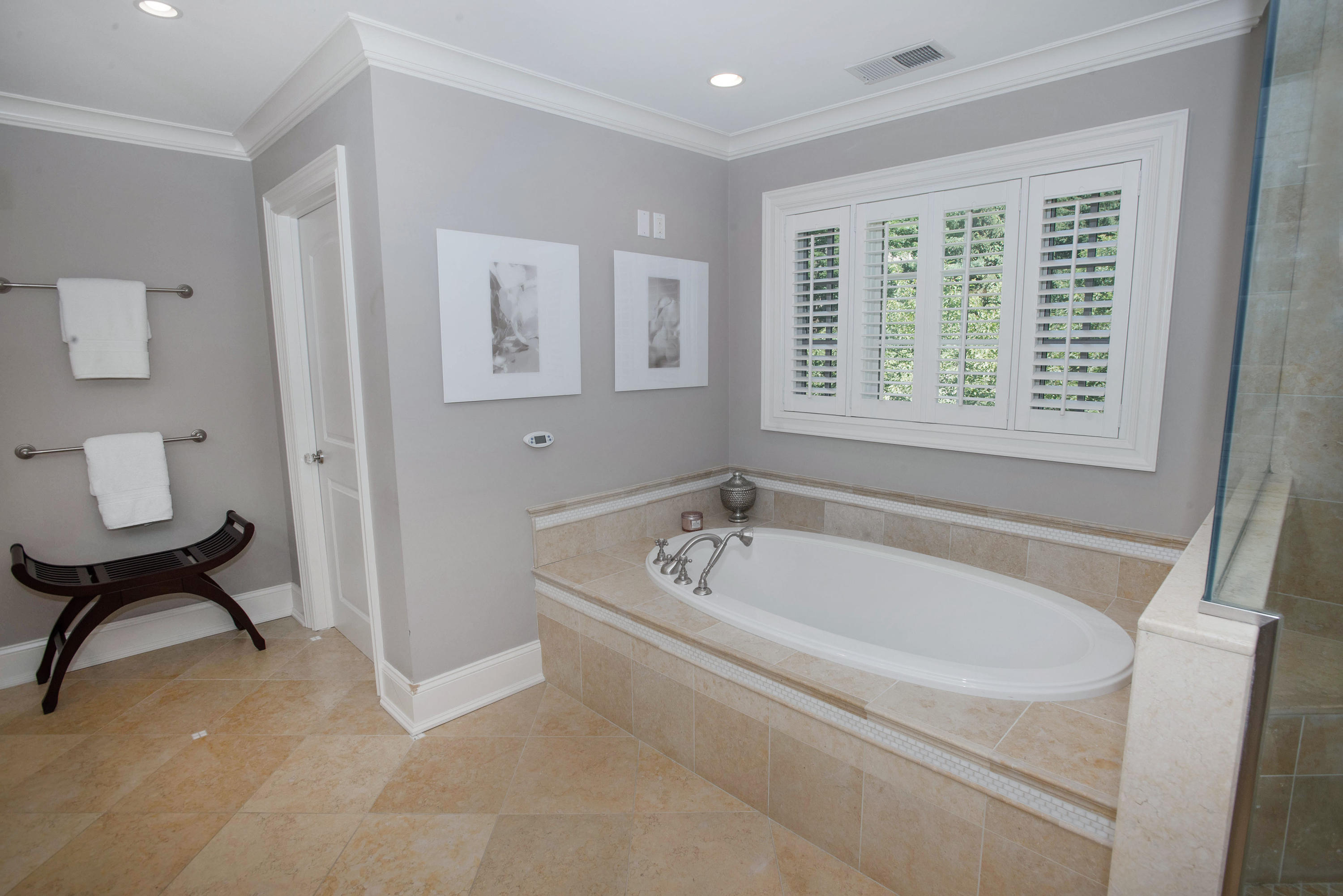 20 Silvermine Road New Canaan, CT 06840 - Photo 27 of 45 a white bath tub sitting next to a toilet