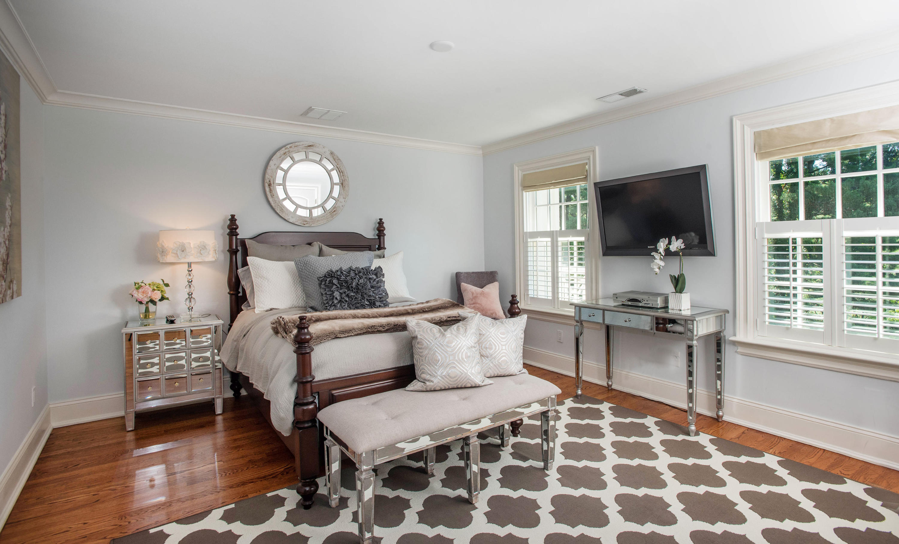 20 Silvermine Road New Canaan, CT 06840 - Photo 28 of 45 a bedroom with furniture and a flat screen tv