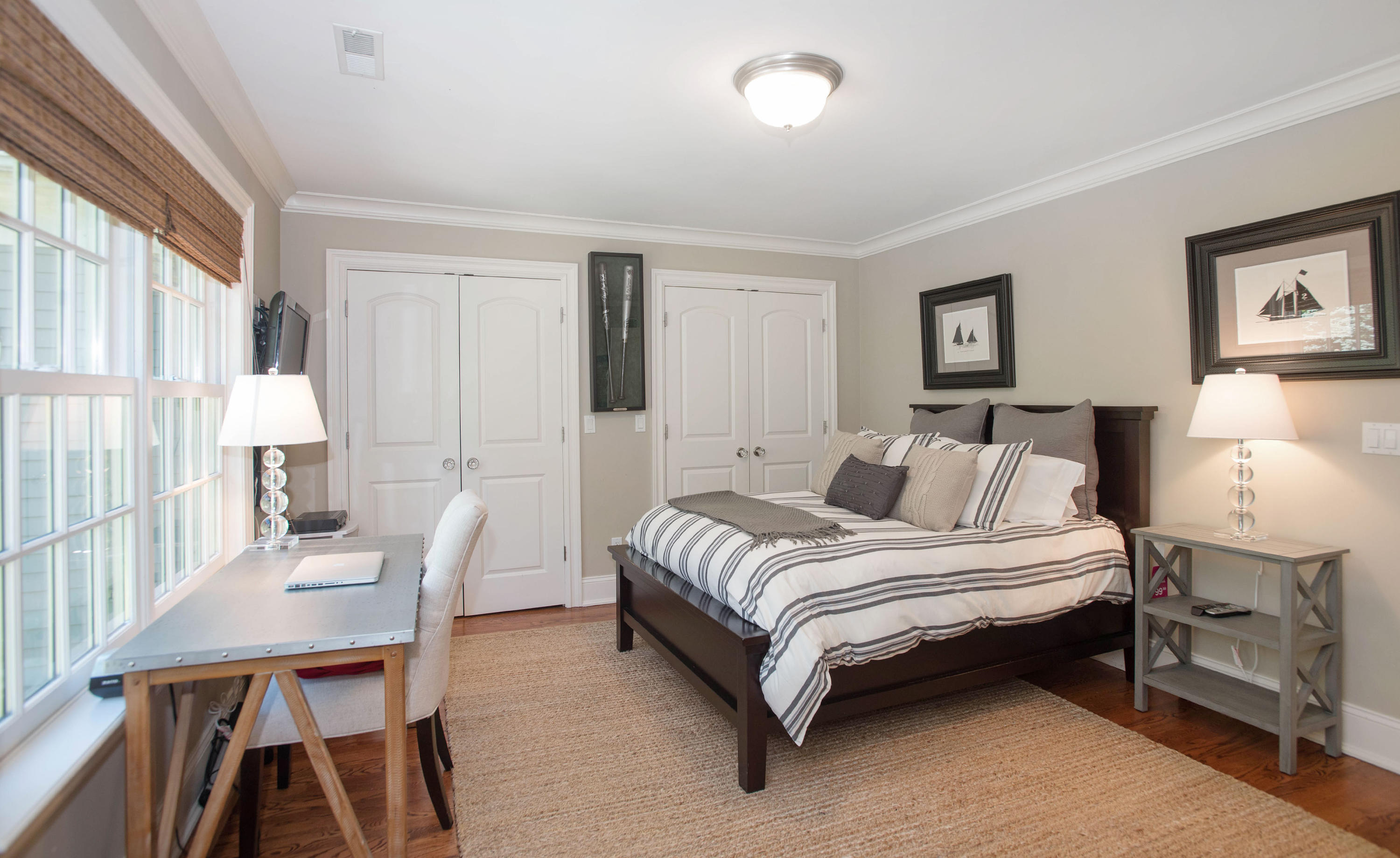 20 Silvermine Road New Canaan, CT 06840 - Photo 30 of 45 a bedroom with a bed a large window and table