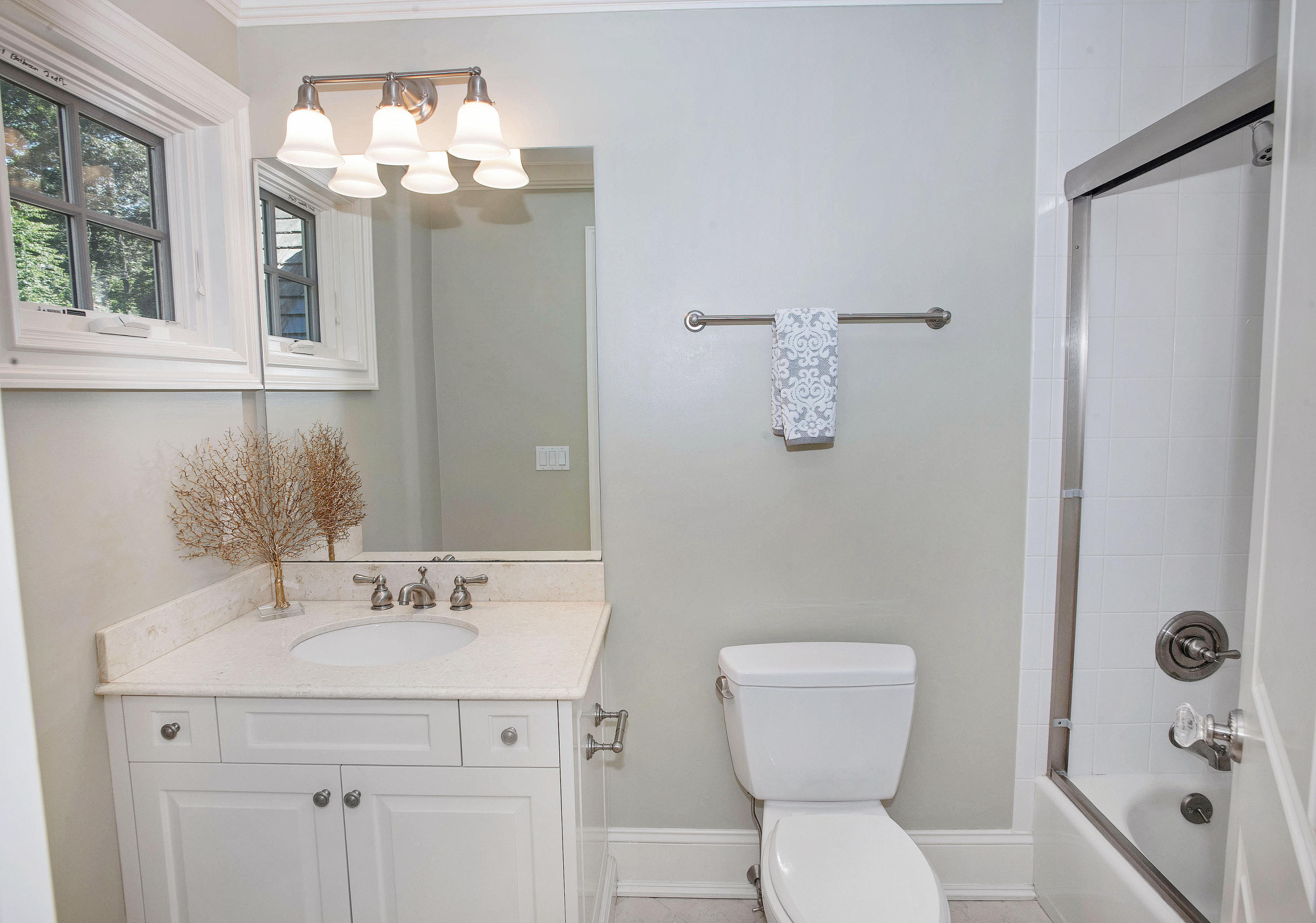 20 Silvermine Road New Canaan, CT 06840 - Photo 33 of 45 a bathroom with a sink a toilet and shower