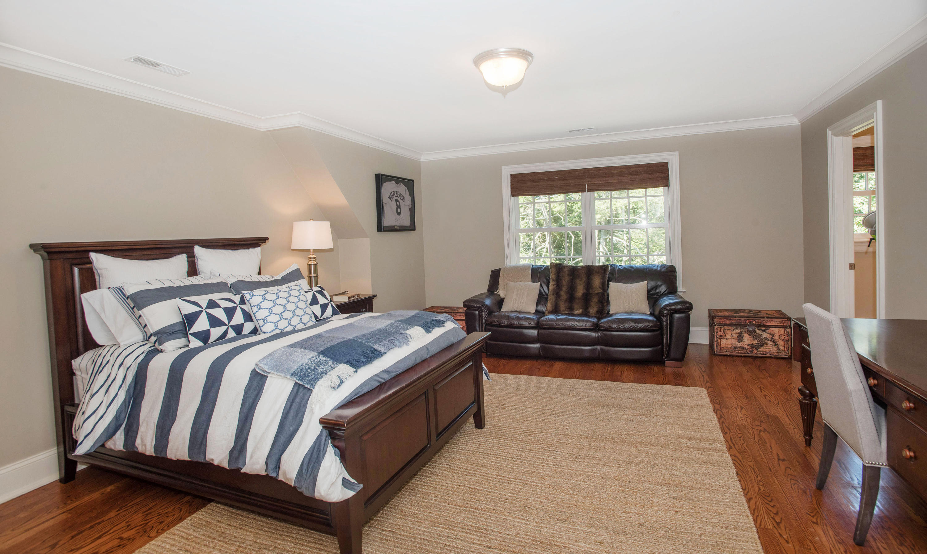 20 Silvermine Road New Canaan, CT 06840 - Photo 34 of 45 a bed room with a bed and a couch