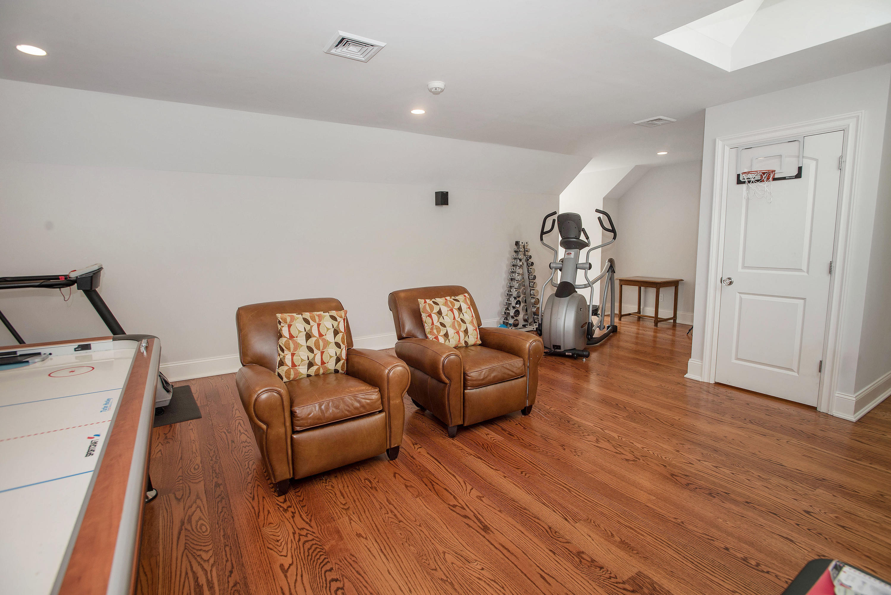 20 Silvermine Road New Canaan, CT 06840 - Photo 35 of 45 a living room with furniture and a wooden floor