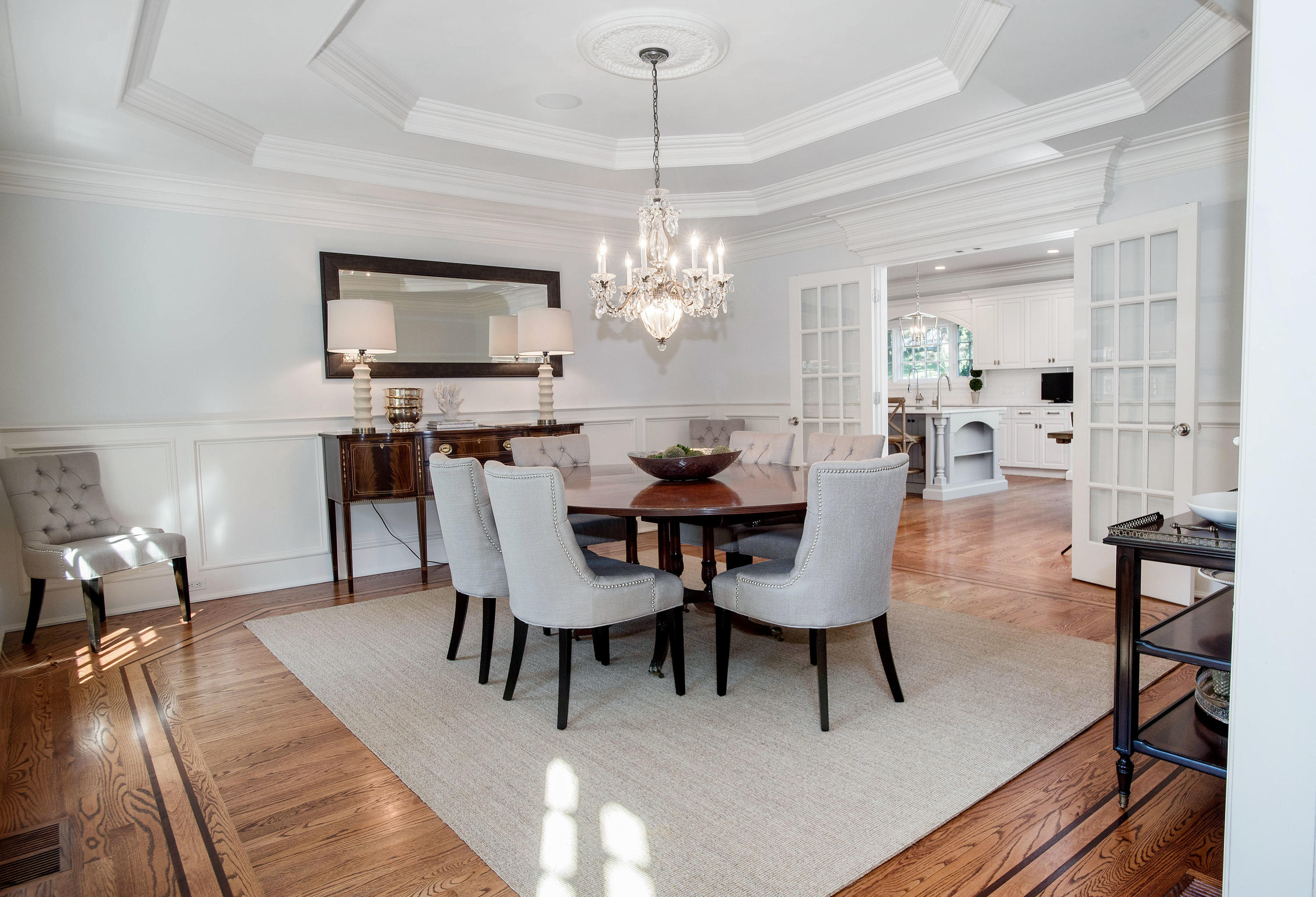 20 Silvermine Road New Canaan, CT 06840 - Photo 7 of 45 a dining room with furniture a chandelier and wooden floor