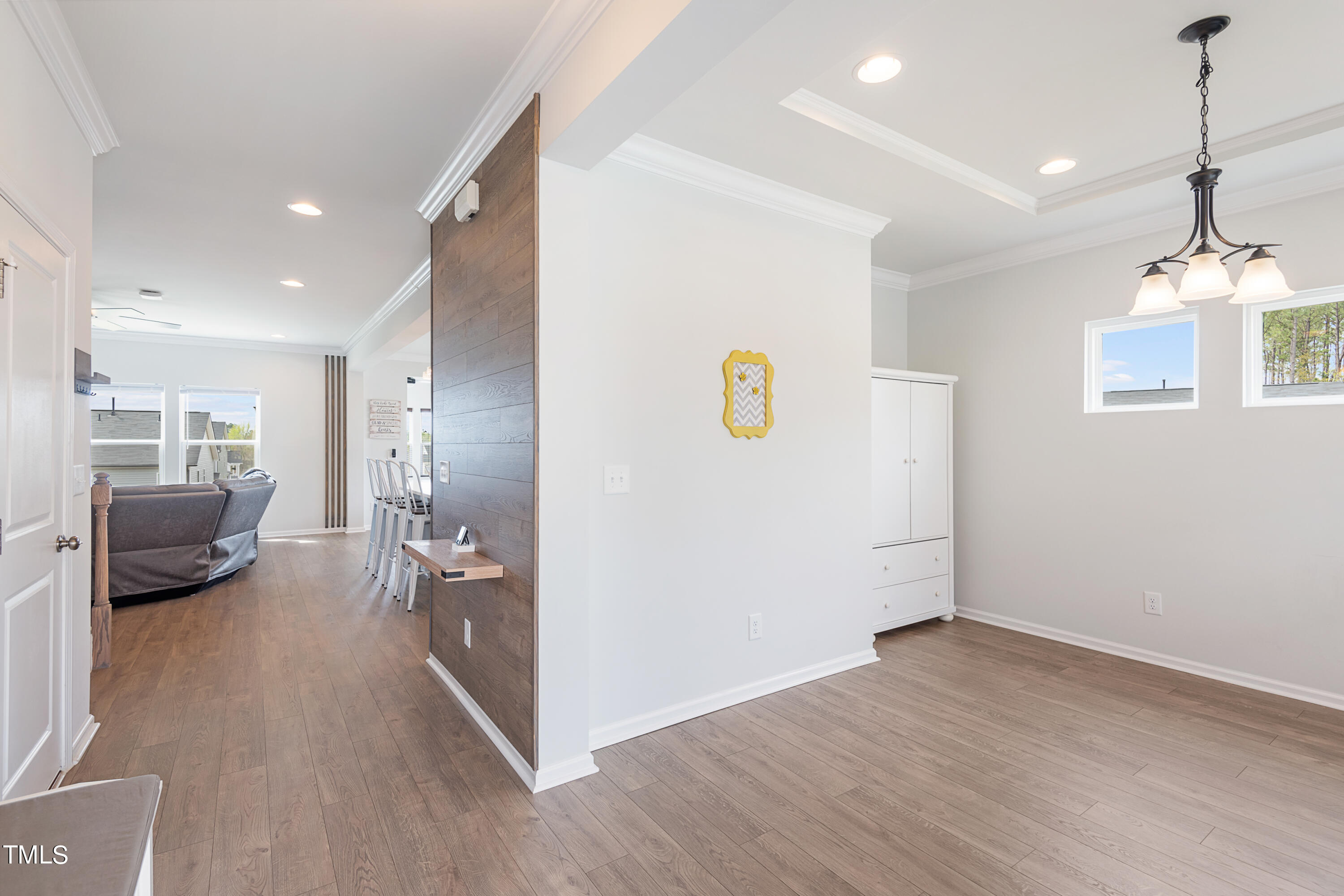 3402 Norway Spruce Road Raleigh, NC 27616 - Photo 5 of 46 Inviting Entry with wood laminate floors