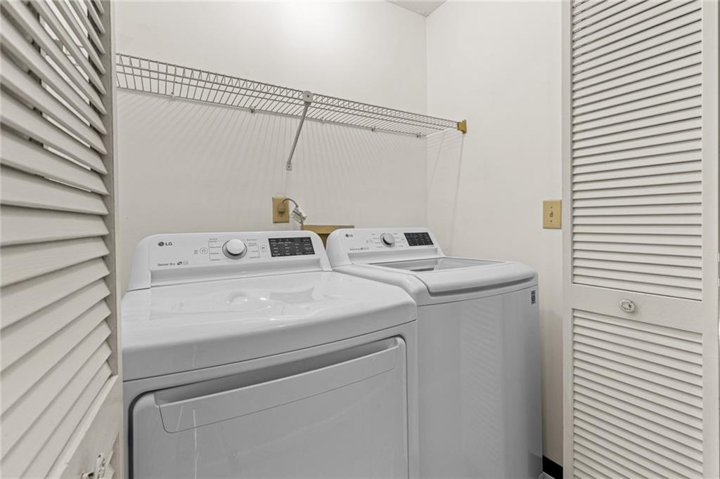 2217 Spring Walk Court Atlanta, GA 30341 - Photo 9 of 23 a utility room with dryer and washer