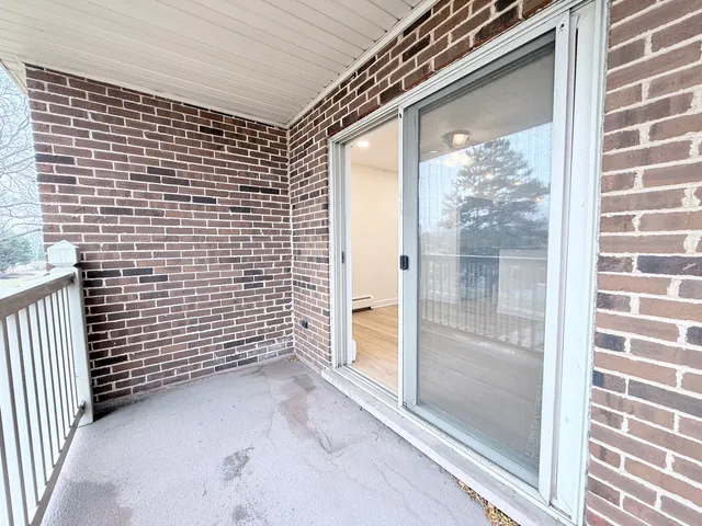 a view of a glass door and window