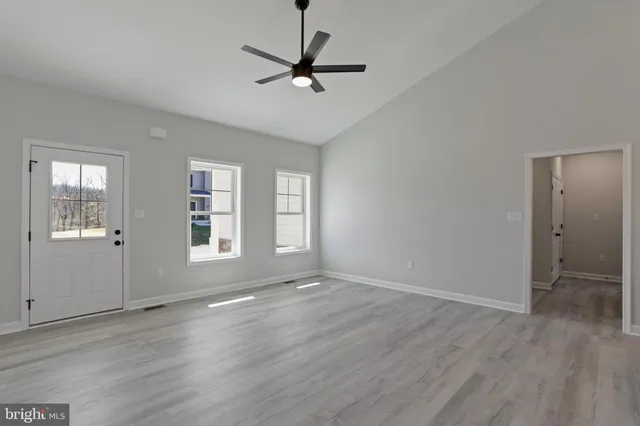 a view of a room with racks on the wall
