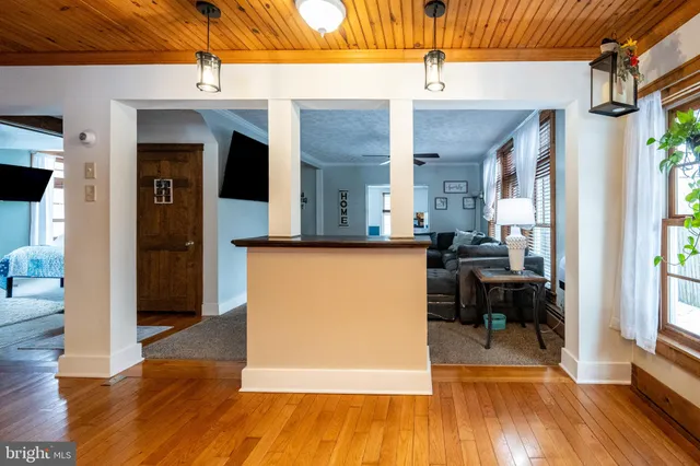 a utility room with cabinets dryer and washer