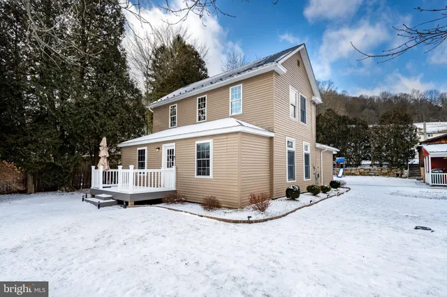 a front view of a house with a garage