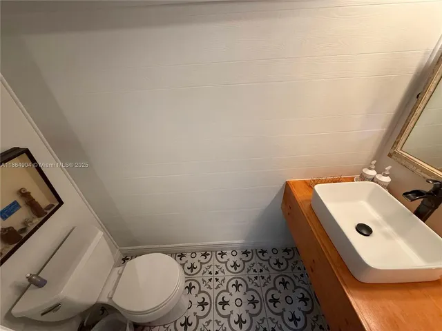 a bathroom with a sink and a toilet