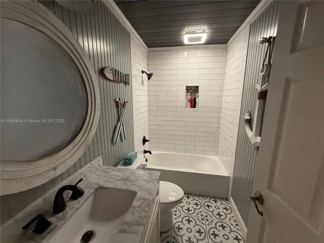 a bathroom with a sink and a bathtub
