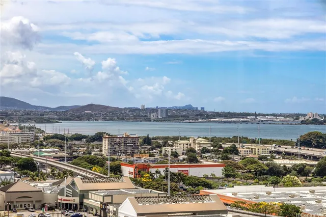 a view of a lake with a city